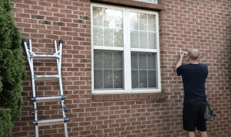 how-to-replace-install-vinyl-shutters-on-a-brick-house