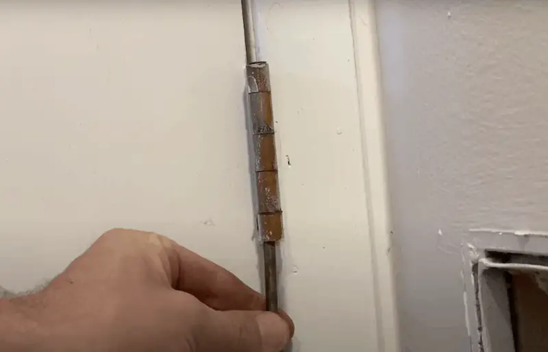 Tapping pins to remove old hinges