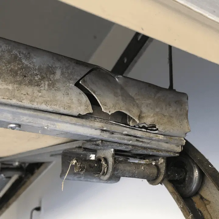 Replacing damaged garage door bottom seal