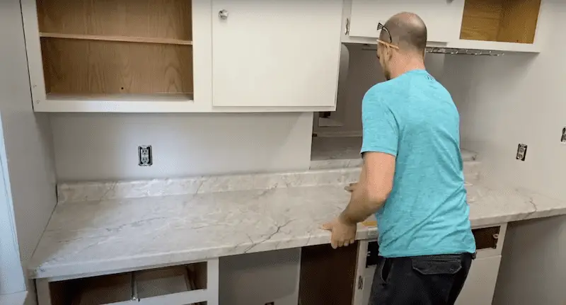 Setting the laminate countertop to make sure it fits