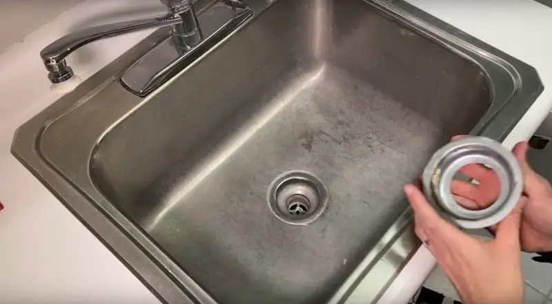 Replace a Kitchen Sink Strainer: removing the mounting cup