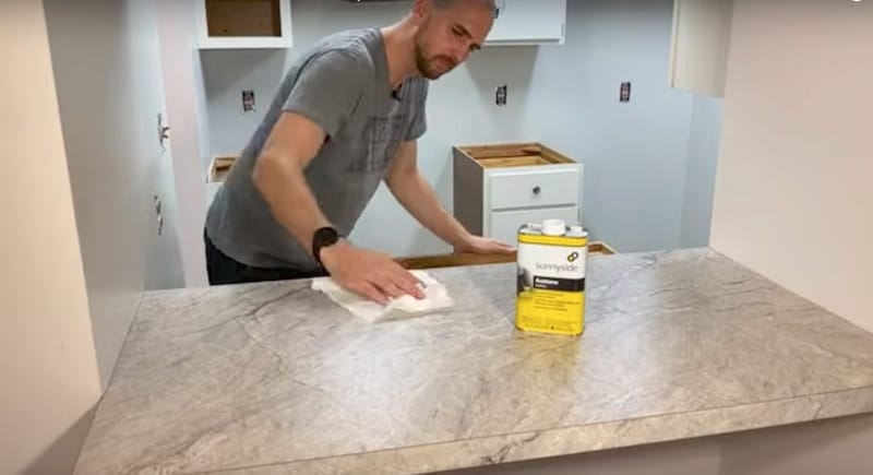 How to Install Sheet Laminate on a Countertop final step: wiping down all surfaces with acetone
