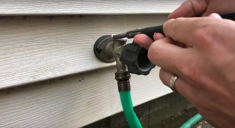 Removing the valve casing of the spigot with channel locks