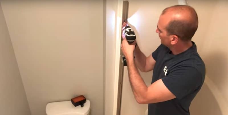 Removing the side rails of the shower door frame