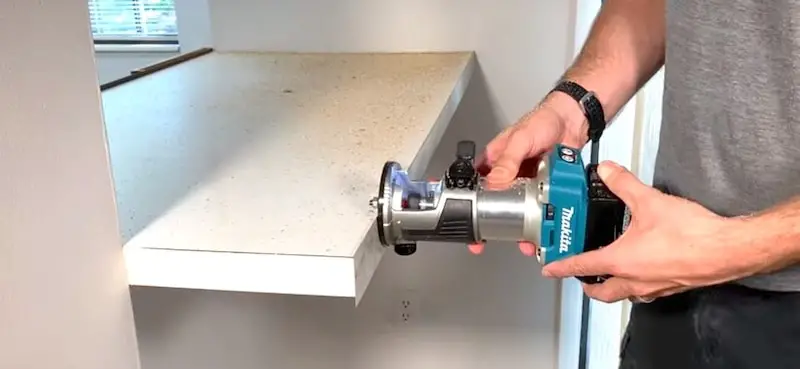 Using a router with flush-cut bit to trim the excess from the side pieces