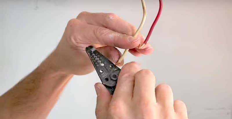 Bending the wire using the hole in the jaws of the wire strippers