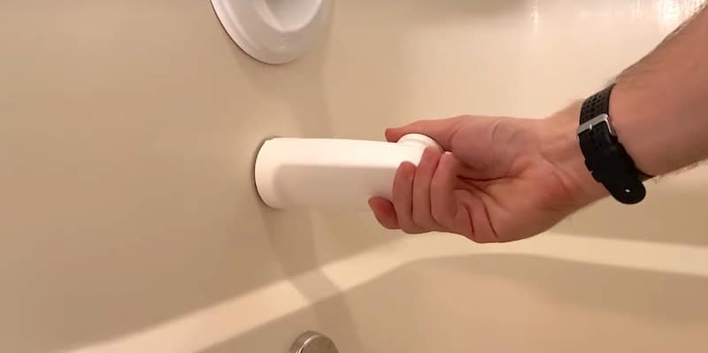 Turning the spout counterclockwise to remove it