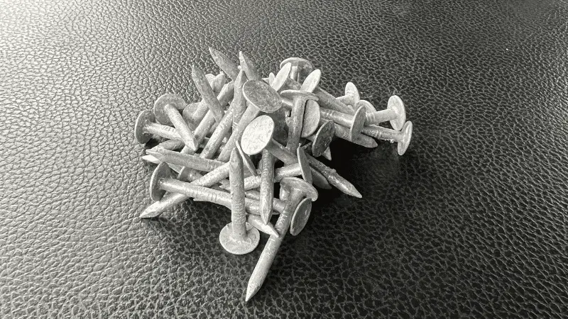 pile of galvanized roofing nails