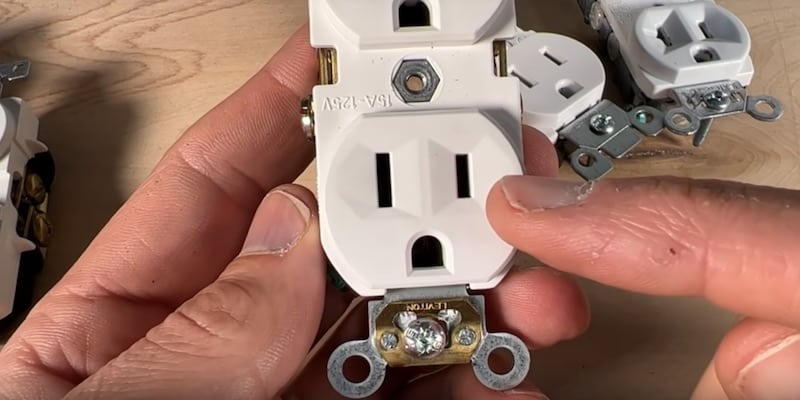 Larger slot (neutral) and smaller slot (hot) on a standard outlet