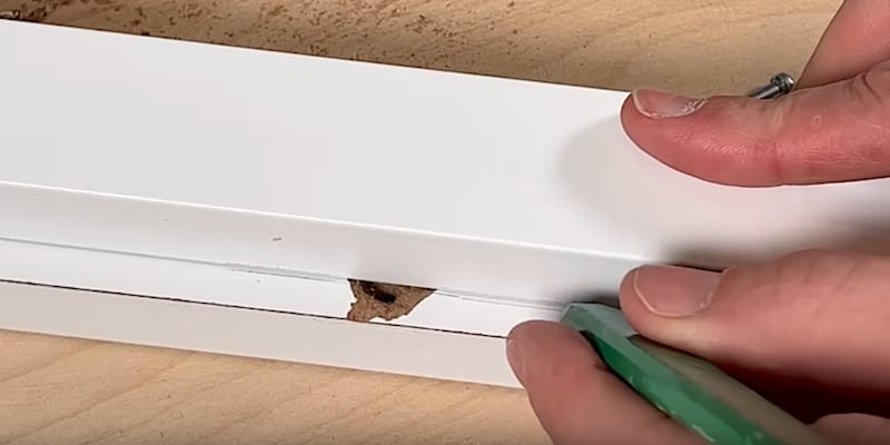 Fix Damaged Ikea Furniture: Marking the center point of the cam screw