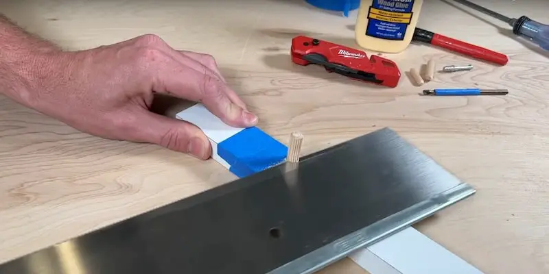 Fix Damaged Ikea Furniture: Cutting down the dowel with a mitre-box saw