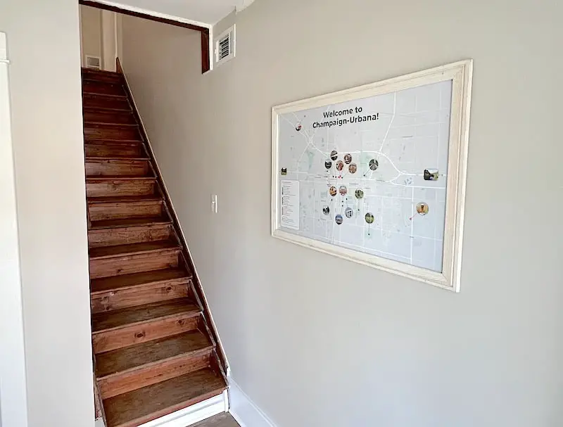 Custom “Things to Do” Airbnb Map: The framed 24" x 36" map hung at eye level for optimal viewing