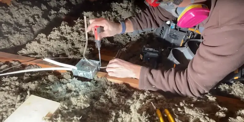 DIY Recessed Lighting: Tightening down the Romex in the junction box