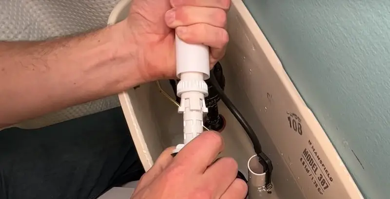How to Adjust the Water Level in a Toilet: Elongating the tubular body of the fill valve