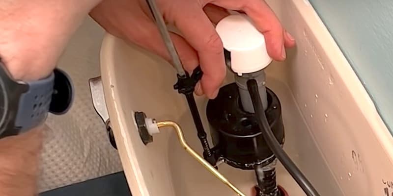 How to Adjust the Water Level in a Toilet: Adjusting the Lever Arm