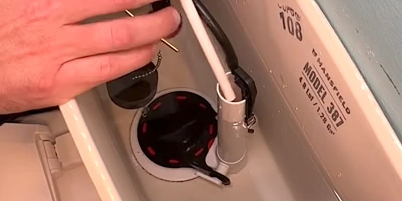 How to Adjust the Water Level in a Toilet: proper positioning of older-style fill tube