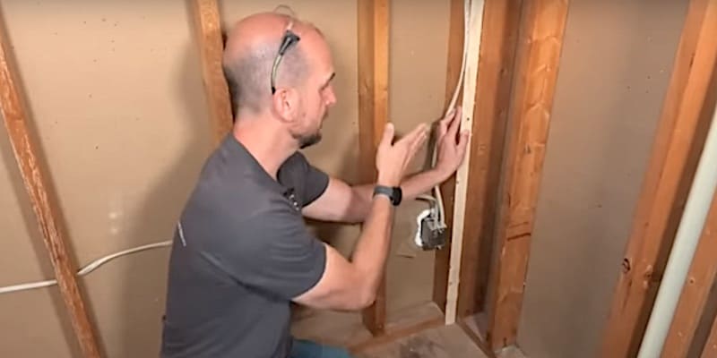 How to Install a Bathtub & Shower Surround: Adding a furring strip to rectify a set-back stud