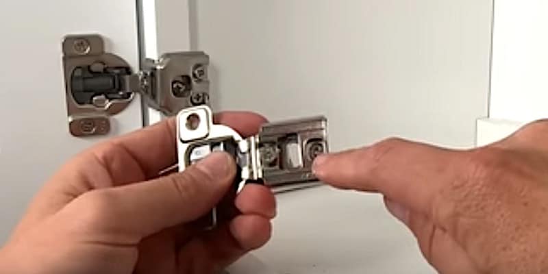 Depth-adjustment screw on this mid-quality hinge is a Posidriv