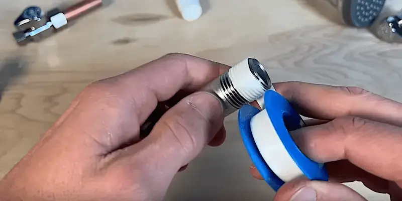 When and How to Use Teflon Tape: Rolling the pipe to apply the tape
