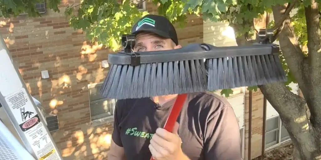 “Revised” broom with handle inserted from the bristles side