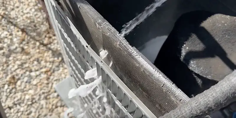 Water passing through the coils and fins from the inside of the unit